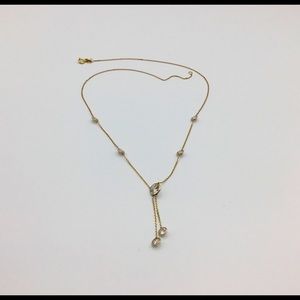 14 carat gold necklace with 7 CZ Diamonds